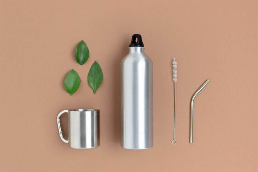 Set of reusable camping utensils (straw, water bottle and cup)