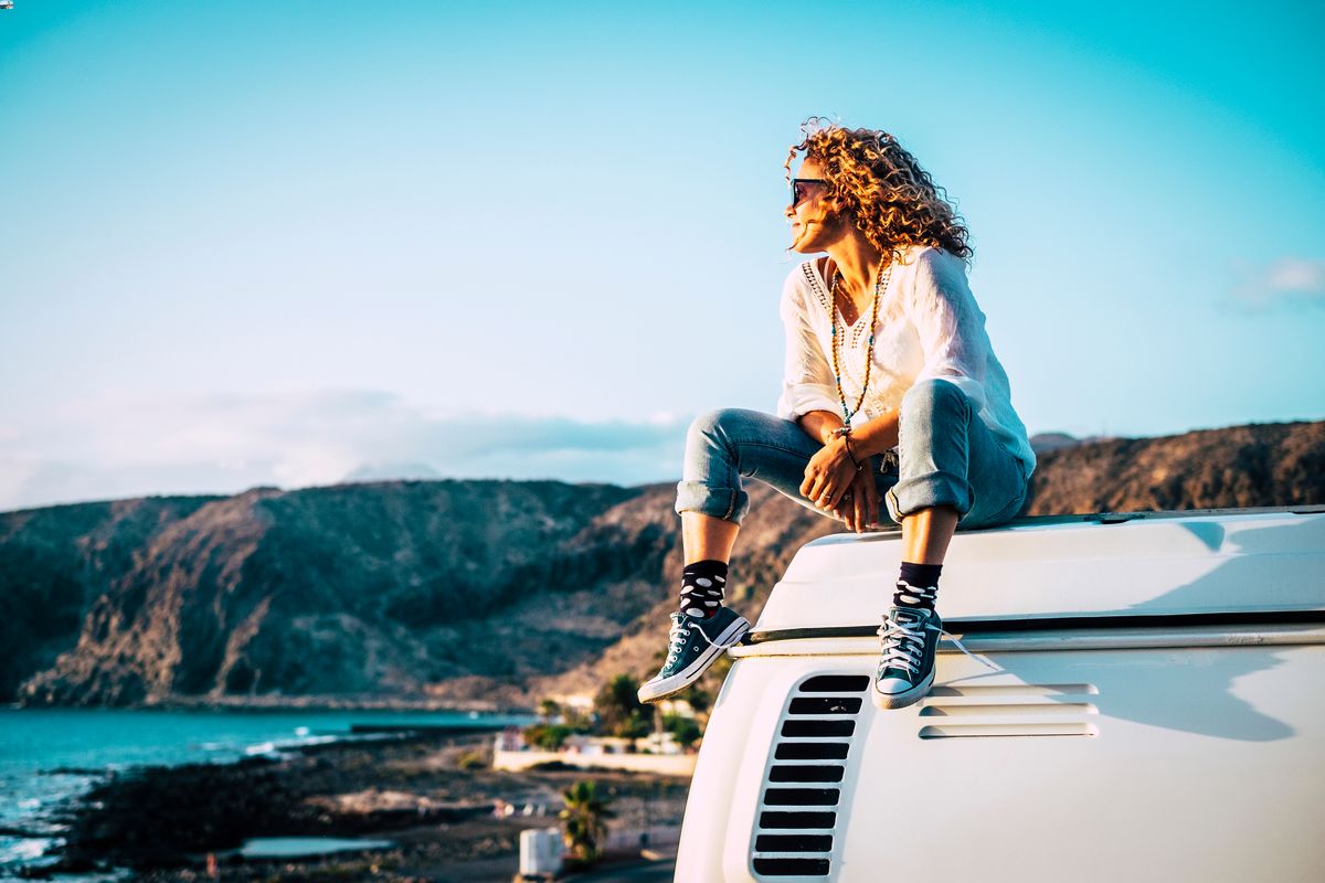 woman enjoying a campervan trip