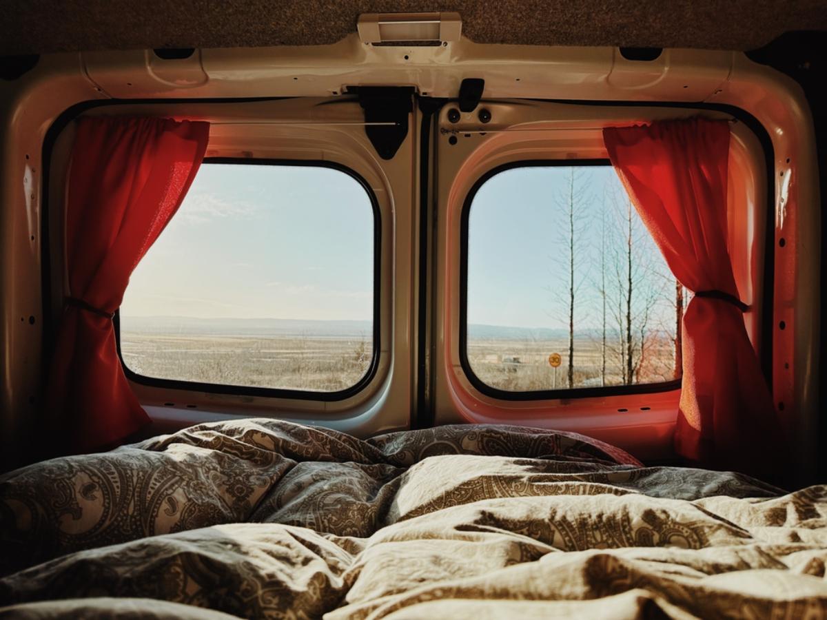 View of Iceland's landscape from the rear windows of a campervan