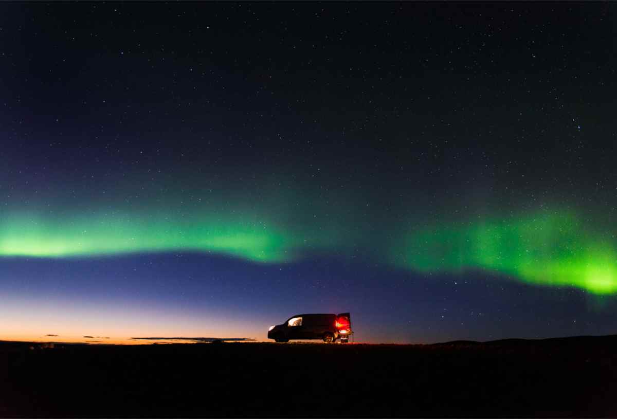 Campervan under the northern lights
