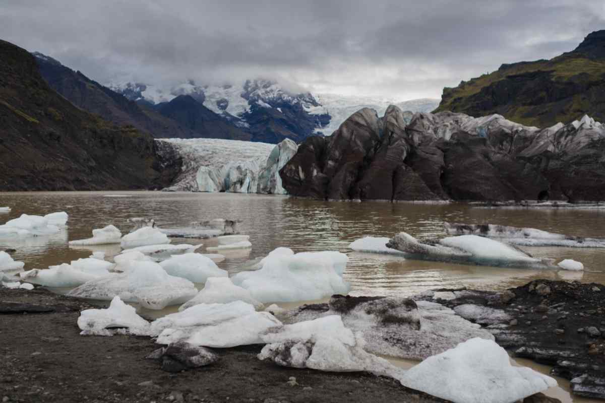 View of Svinafellsjokull Glacier with floating icebergs in the foreground, Skaftafell, Iceland