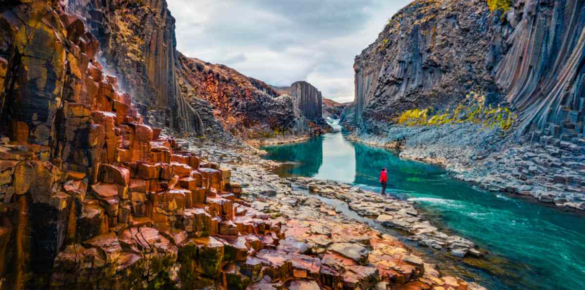Tourist hiking to Studlagil canyon