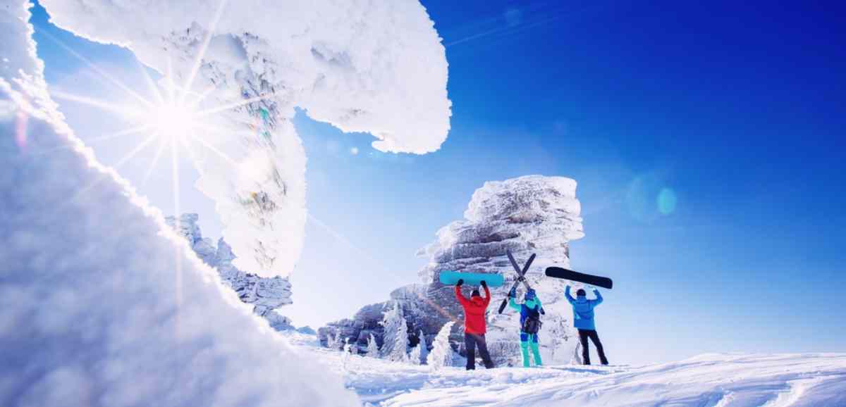 Trio of skiiers and snowboarders