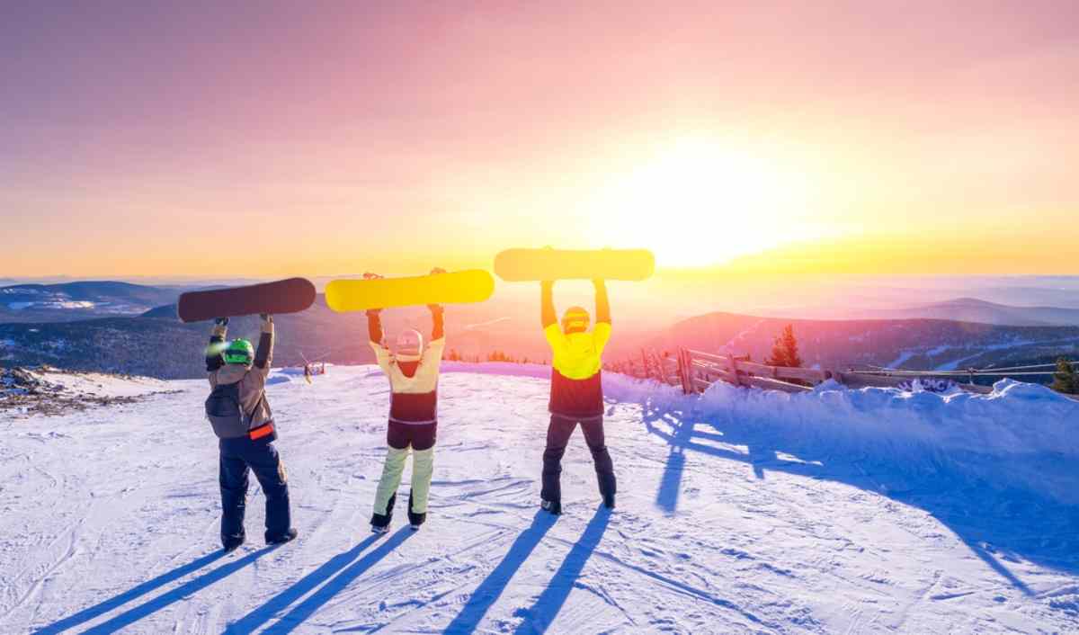Trio of snowboarders in Iceland